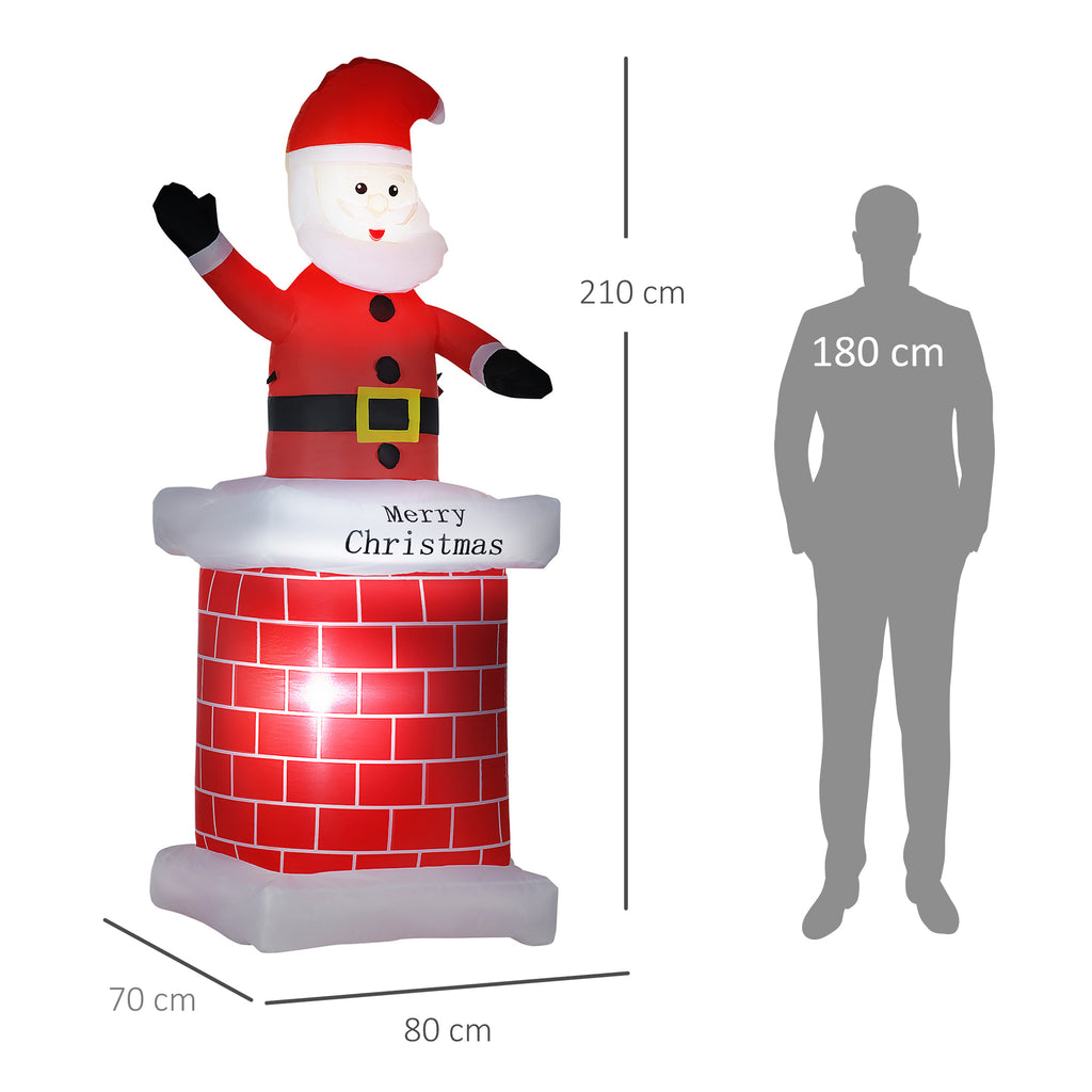 Medidas del Papá Noel hinchable en chimenea: 210 cm de alto, 80 cm de ancho y 70 cm de fondo, junto a una silueta humana