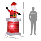Medidas del Papá Noel hinchable en chimenea: 210 cm de alto, 80 cm de ancho y 70 cm de fondo, junto a una silueta humana