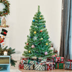 Árbol de Navidad nevado decorado con bolas y regalos