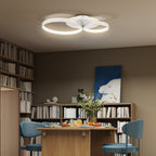 Plafón LED de tres aros en un comedor