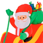 Detalle del Papá Noel sonriente con el saco de regalos sobre el trineo hinchable