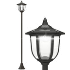 Farola solar de jardín negra con luz LED fría sobre fondo blanco