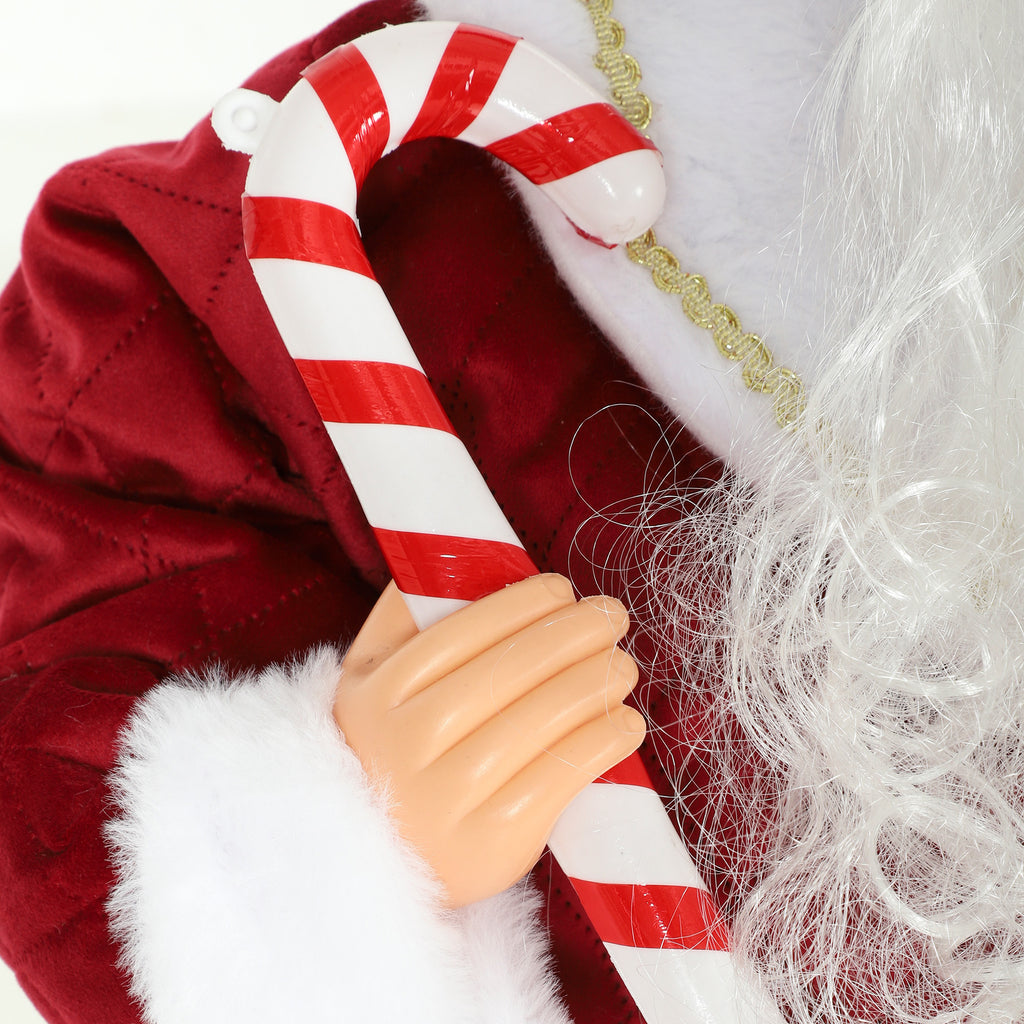Detalle del bastón de caramelo y la mano del Papá Noel animado