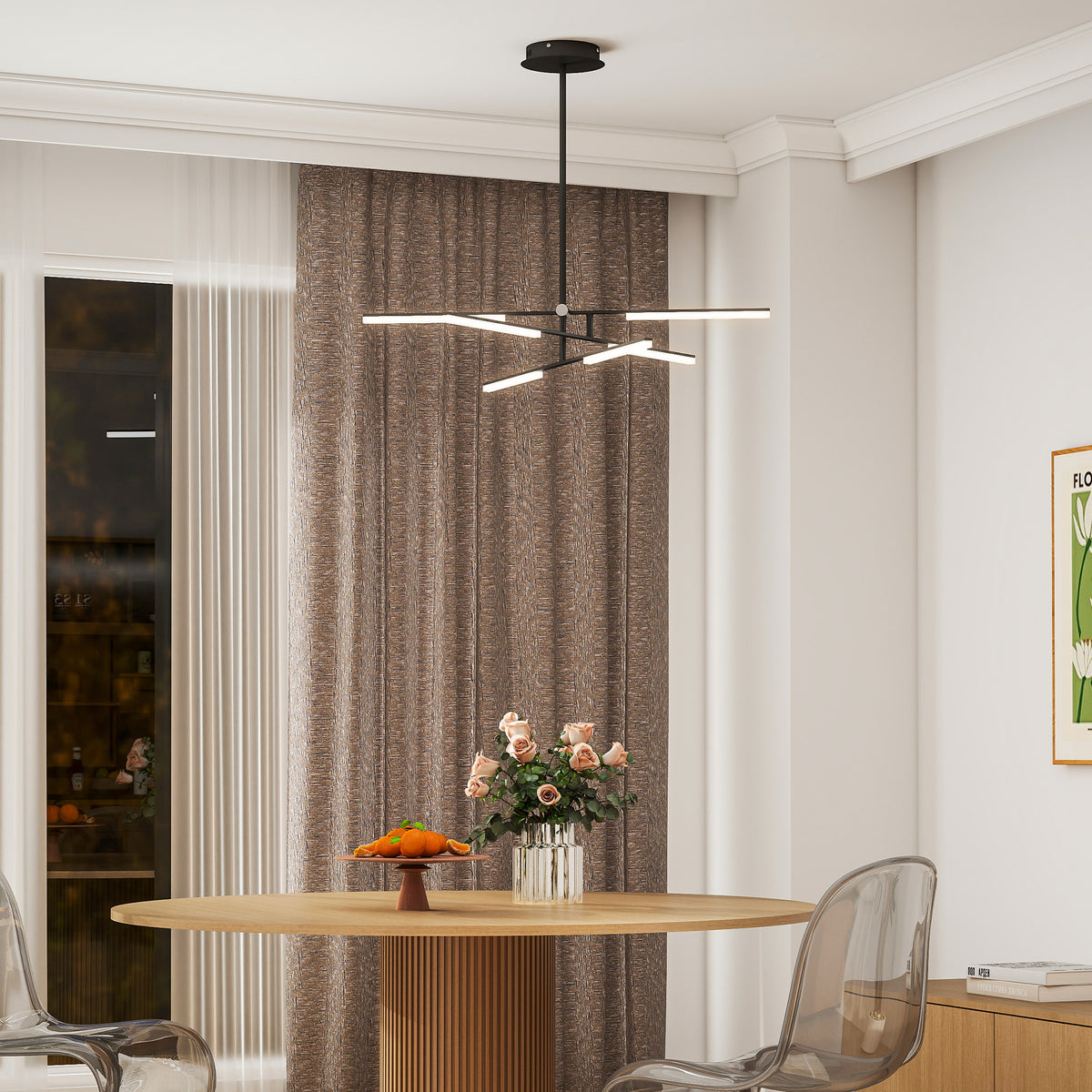 Lámpara colgante LED negra sobre una mesa de comedor