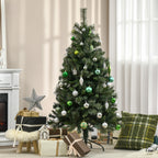 Árbol de Navidad con adornos junto a la chimenea
