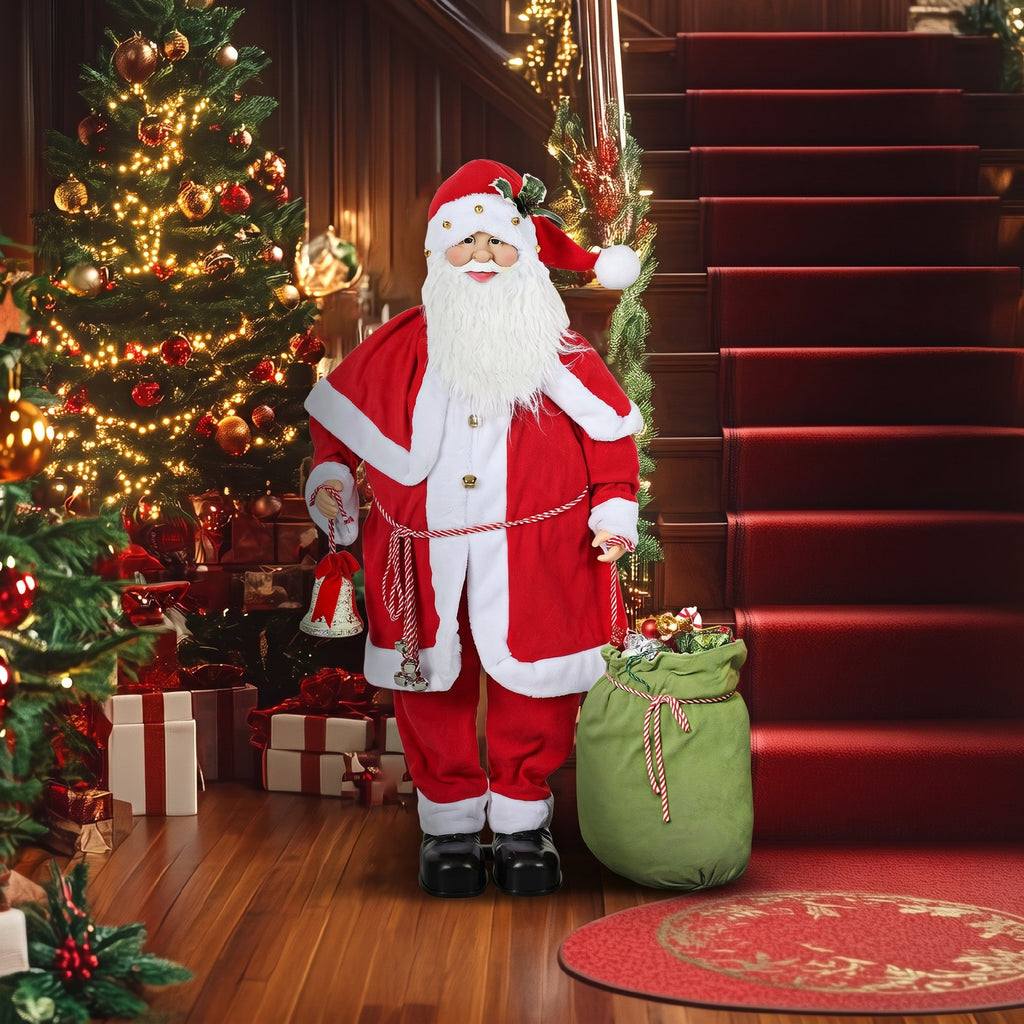 Figura de Papá Noel junto a una escalera con alfombra roja y un árbol de Navidad