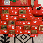 Cajones numerados con tirador blanco y estrellas del calendario de Adviento, con caramelos dentro