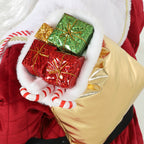 Detalle del saco dorado con cajas de regalo y bastones de caramelo del Papá Noel animado