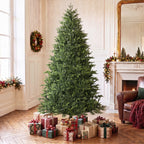 Árbol de Navidad en una sala luminosa con regalos y chimenea