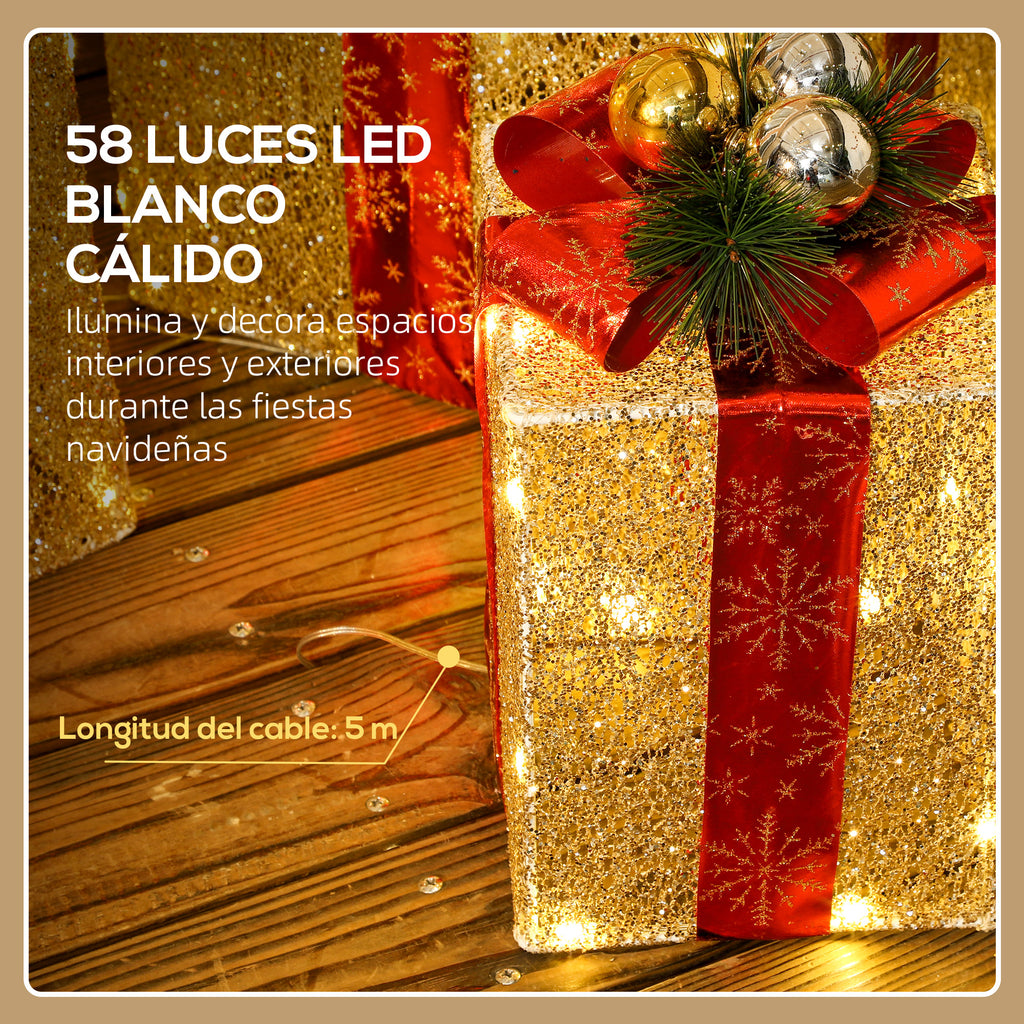 58 luces LED blanco cálido: detalle de la caja de regalo con lazo rojo y bolas doradas