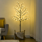 Árbol de cerezo luminoso en una entrada