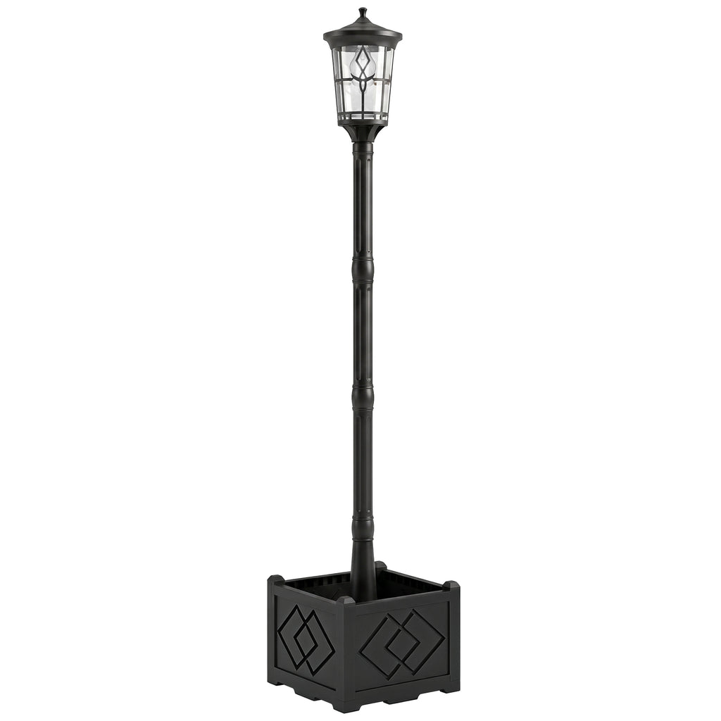 Farola solar de jardín negra con macetero sobre fondo blanco