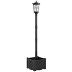 Farola solar de jardín negra con macetero sobre fondo blanco