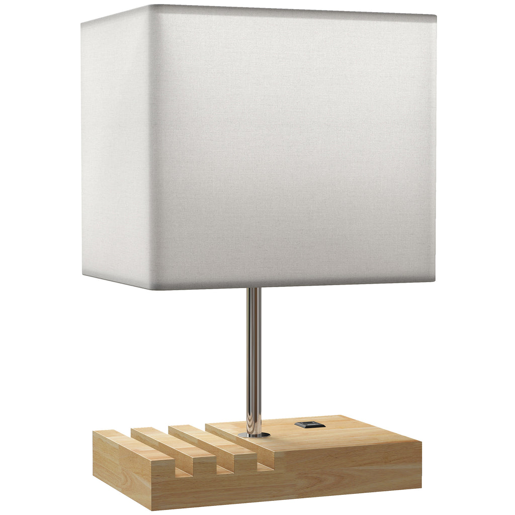 Lámpara de mesa con base de madera, pantalla blanca y puertos USB sobre fondo blanco