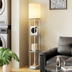 Lámpara de pie gris con estantes junto a un sillón