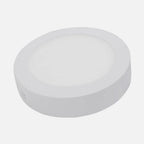 Dos vistas de un downlight LED de superficie blanco de 12 W con tres tonos de luz seleccionables