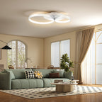 Plafón LED de tres aros blancos en un salón