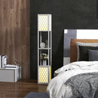 Lámpara de pie gris con estantes y objetos decorativos junto a una cama