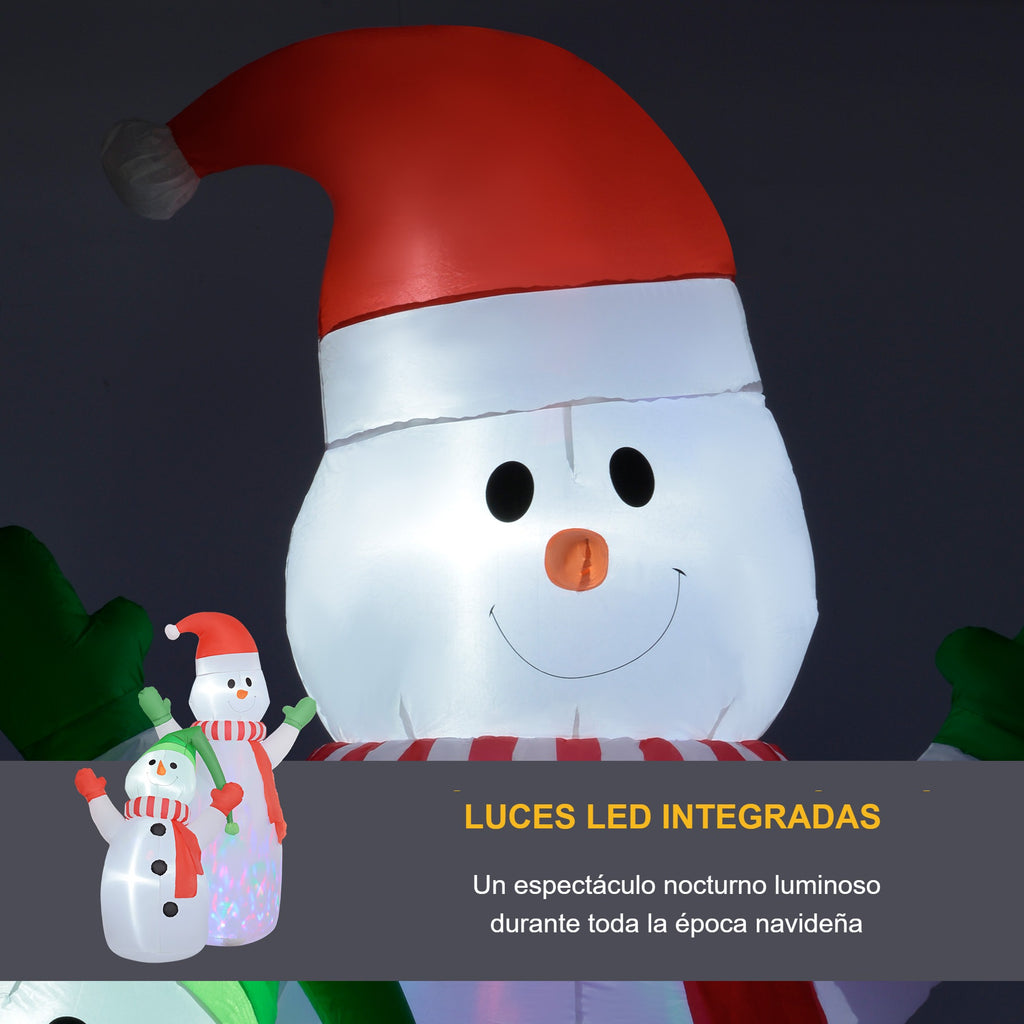 Luces LED integradas: detalle del muñeco de nieve hinchable grande con gorro rojo y nariz de zanahoria