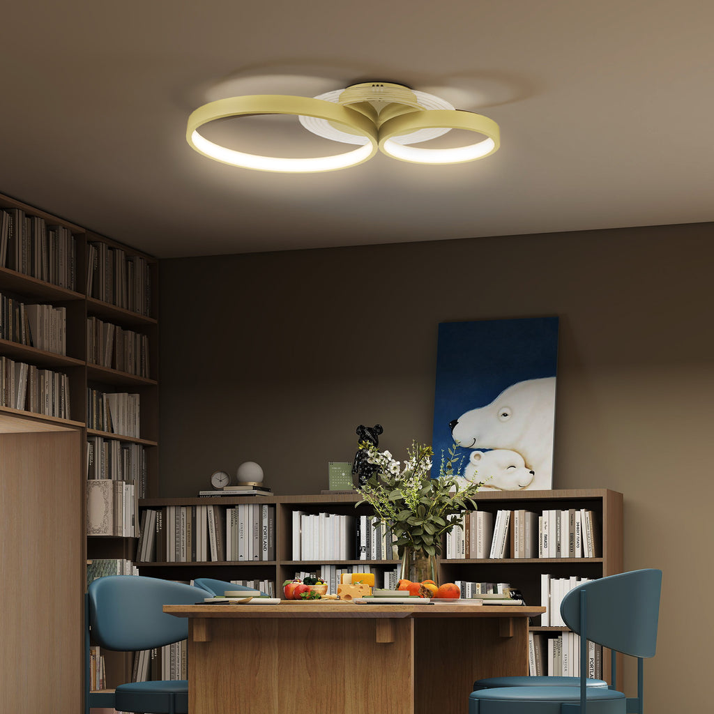 Plafón LED de tres aros en un comedor