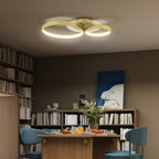 Plafón LED de tres aros en un comedor