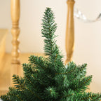 Detalle de la punta del abeto de Navidad con un fondo de madera