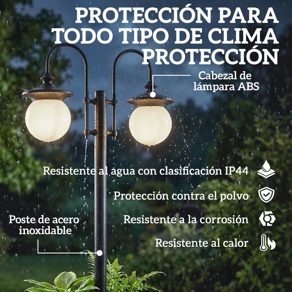 Farola solar con macetero en un jardín