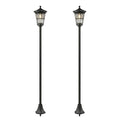 Set de 2 farolas solares de jardín negras de altura ajustable sobre fondo blanco