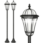 Set de 2 farolas solares de jardín negras sobre fondo blanco